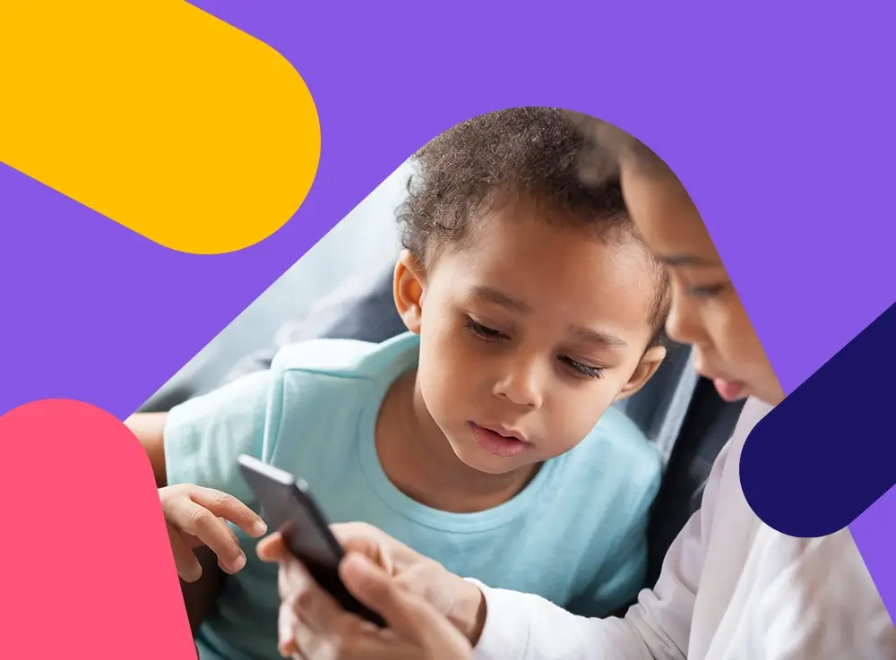 Two children using a smartphone